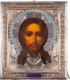 AN ICON OF THE MANDYLION WITH SILVER AND ENAMEL OKLAD: AN ICON OF THE MANDYLION WITH SILVER AND ENAMEL OKLAD Russian, late 19th century (icon), Russian, Moscow, 1896-1908 (oklad and enamel) Oil on wood panel with velvet backing. Overlaid with an engraved