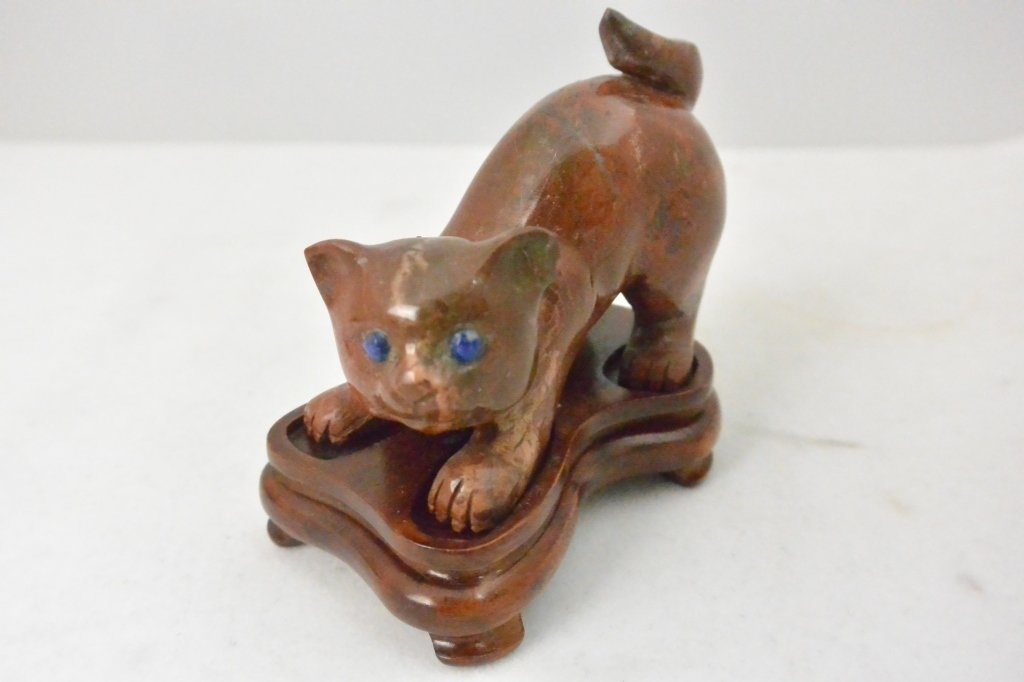 Carved carnelian statute with base- "Cat": Carved carnelian cat statute. JIGAN MANAO. Size: 3"HT. 3"W.