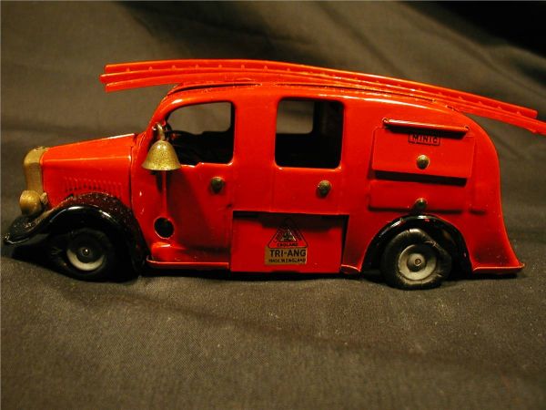 Minic Fire Truck, 5 3/4" Long, Near Mint-working: Minic Fire Truck, 5 3/4" Long, Near Mint-working condition. Original black rubber tires have serious flat spots