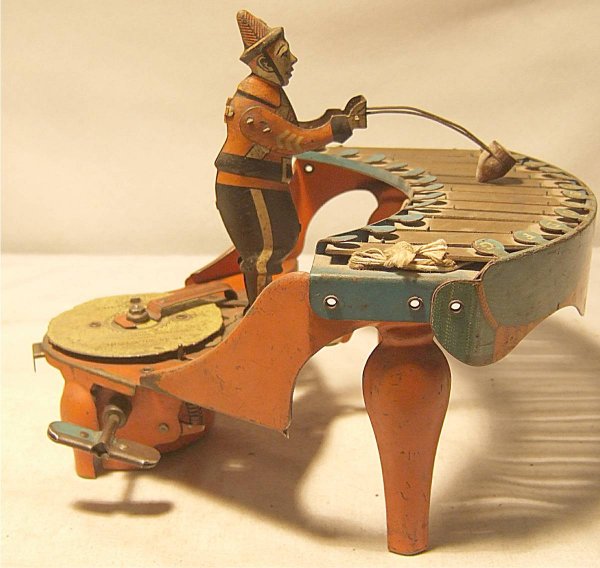 Vintage Wolverine Zilotone Wind-up Tin Toy, 8W x