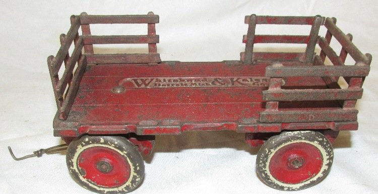 1920's Whitehead & Kates Detroit Mich. Iron Toy Farm: 1920's Whitehead & Kates Detroit Mich. Iron Toy Farm Wagon by Arcade, Missing two fence pieces, 7 x 3 1/2", EC