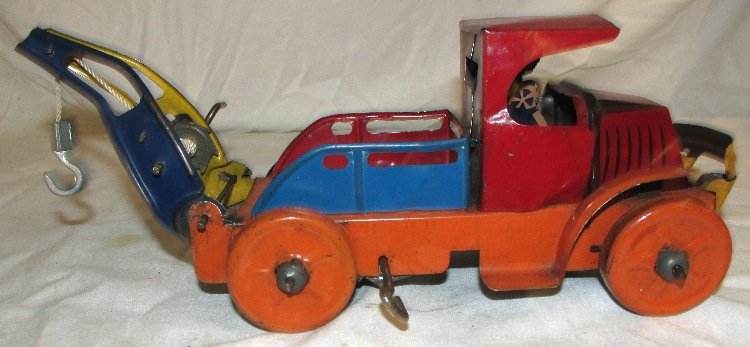 Marx tin windup Bull Dog Mack towing wrecker truck. All: Marx tin windup Bull Dog Mack towing wrecker truck. All original very early marx toy. Excellent Condition