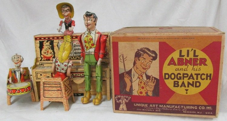 Unique Art Tin Windup Lil Abner and His Dogpatch Band.: Unique Art Tin Windup Lil Abner and His Dogpatch Band. All original and complete with original box. Near Mint Condition