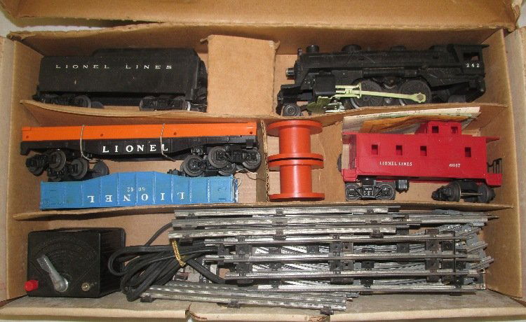 Lionel Freight Train Set #11201 w/ Box: Complete set includes # 2026 Steam Locomotive, # 6066T Tender, #6042 Gondola, #242 L&T Flat Car with orange girder, Two Orange Reels, #6035 Tank Car, #6032 Gondola, and 64 Highway Car. With original s