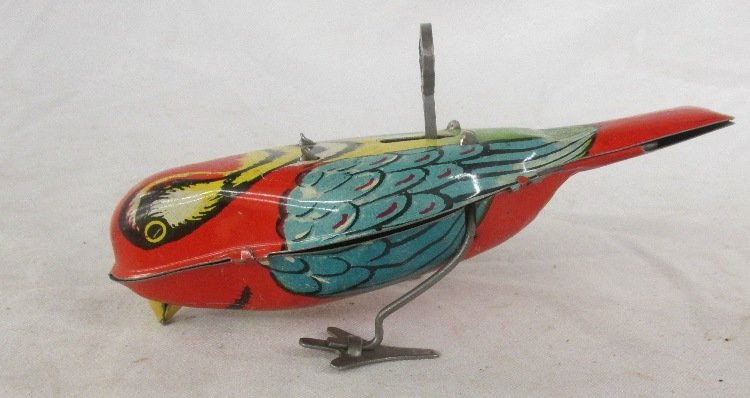 Lindstrom Tin wind up Bird: All original. Very colorful. Condition Excellent