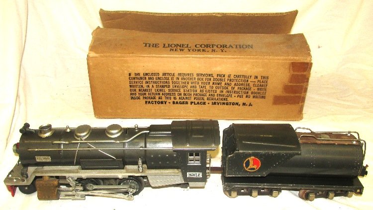 Lionel #263E Locomotive and tender: All original. Needs rear truck wheels on engine. With original box for engine. Very Good- Excellent