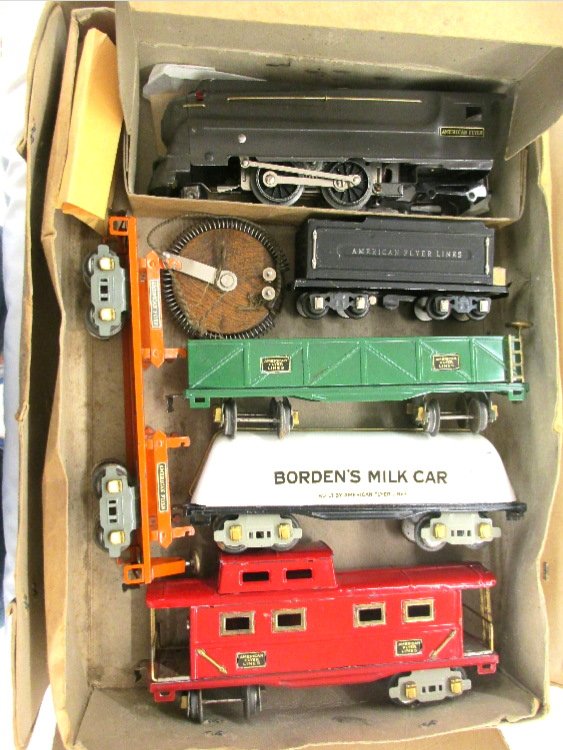 American Flyer Nation-Wide Fright Train Set RARE w/Box: Very Rare American Flyer Nation-Wide JC Penny Exclusive Pre-War O-Guage Set includes Torpedo Style Engine with matching Tender, RARE Bordens Milk Car, #3206 Machinery Car, Green Gondola, and #3211 Cab