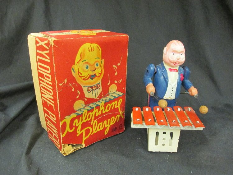MT JAPAN Tin & Celluloid XYLOPHONE PLAYER w/Box: All original and complete with original box. Near Mint
