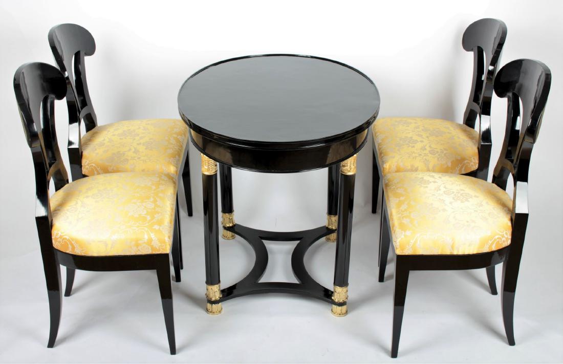 Biedermeier table and four chairs: Bohemia, 20th years of the 19th century, table, four chairs, black French polish, newly upholstered, restored, dimensions of chair 93,5 x 47 x 42 cm. Tentative estimated price (EUR): 6 800 - 8 000 Ten