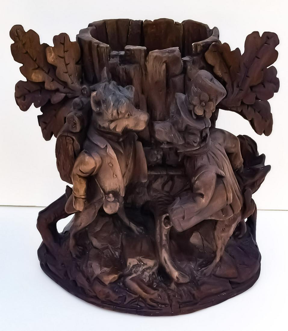 Black Forest Carving 4 of 20: Black Forest Carving 4 of 20 Dogs In Suits Vase Bar Caddy or Holder. 9.1 x 8.5 x 5.8 inches. Provenance: This German Austrian Swiss Bavarian Alpine figural carving is one of twenty in the sale from th