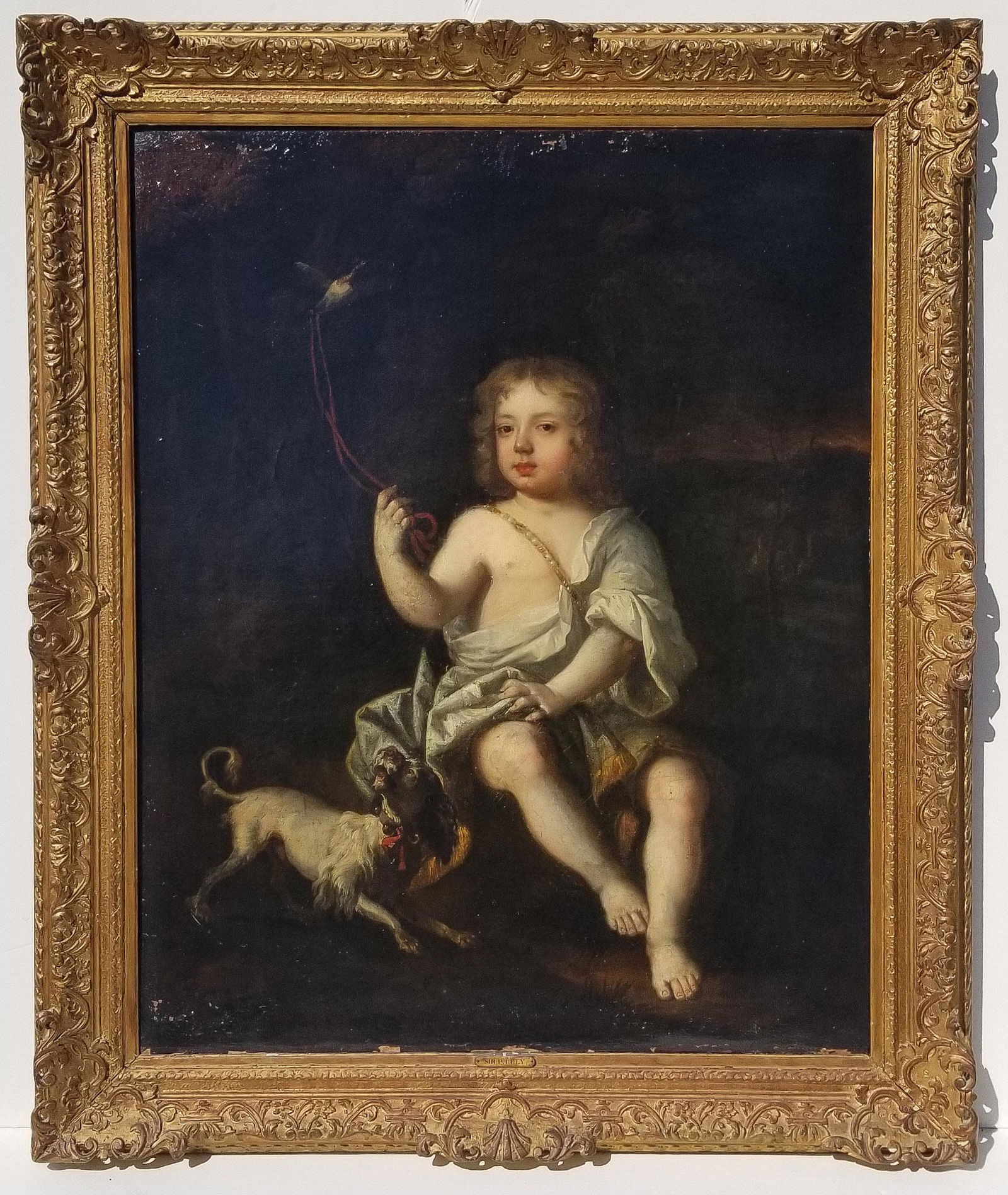 Sir Peter Lely Boy with Dog Portrait: Sir Peter Lely Boy with Dog Portrait Holding a Tethered Bird Seated in a Landscape, oil on canvas, 48 x 40 inches, 58.5 x 49 x 3 inches framed, no visible signature however note that the painting has