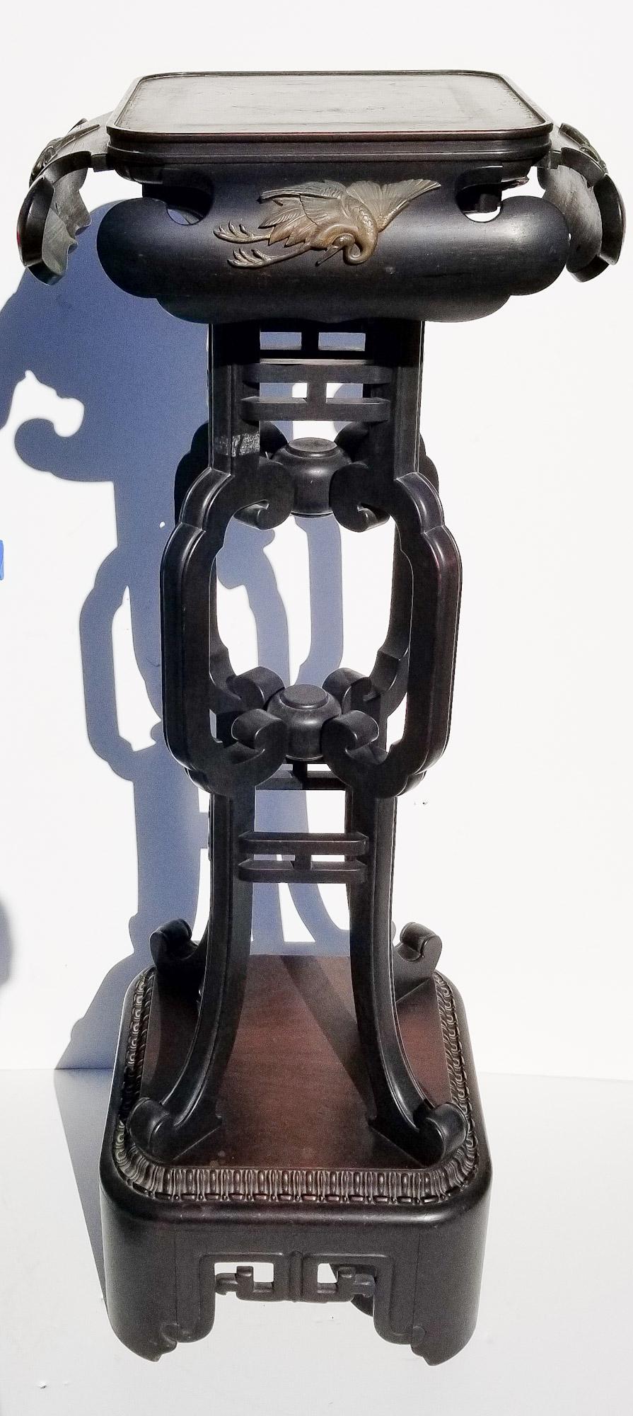 Monumental Japanese Meiji Plant Stand: Monumental Japanese Meiji Plant Stand, carved wood with carved gilt bird relief decorations to each apron, 51 x 19.5 x 19.5 inches.