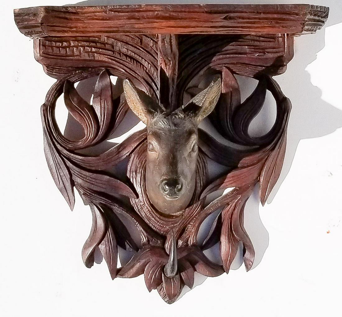 Black Forest Carving 20 of 20: Black Forest Carving 20 of 20, deer stag shelf horn coat hook hat rack, painted eyes, 9 x 9.4 x 5.4 inches. Provenance: This German Austrian Swiss Bavarian Alpine figural carving is one of twenty in t