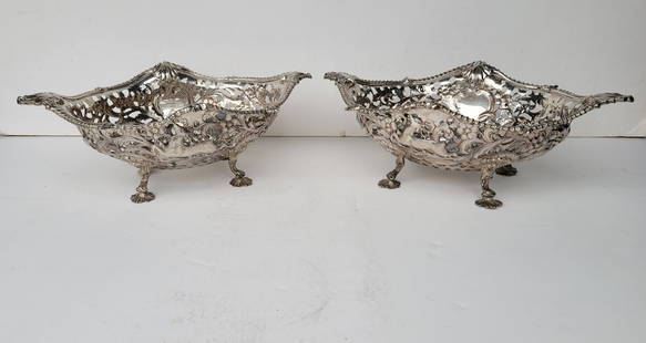 Vanderbilt Estate Pair Paul De Lamerie Silver Baskets: Vanderbilt Estate Pair Paul De Lamerie Silver Baskets, pr footed reticulated English sterling silver bread baskets with hounds hunting a stag, 5 x 13.375 x 19.125 inches each, each British hallmarked,