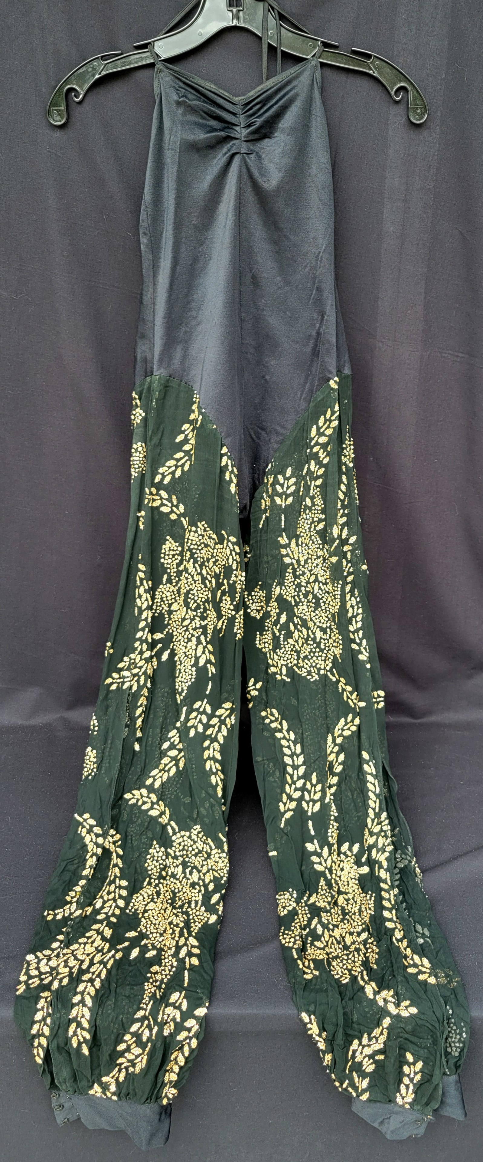 Irene Cara Estate Publically Worn Ellene Warren Gilt Applique Sheer Split Leg Halter Top Plunging: Irene Cara Estate publicly worn Ellene Warren gilt applique sheer split leg halter top plunging back ankle cuff harem jumpsuit COA. We have identified an online black and white concert photo of the ar