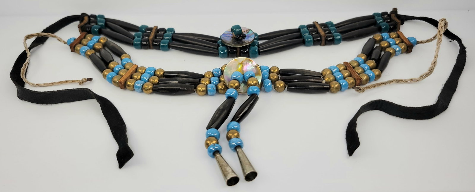 Irene Cara Estate 2 Choker Beaded Necklaces COA: Irene Cara Estate 2 Choker Beaded Necklaces COA. Aprox 11in and 12.25in bead lengths, each plus string ties, aprox 1in and aprox 1.125 widths, materials unidentified. SHIPPING NOTES: Flat rate shippin
