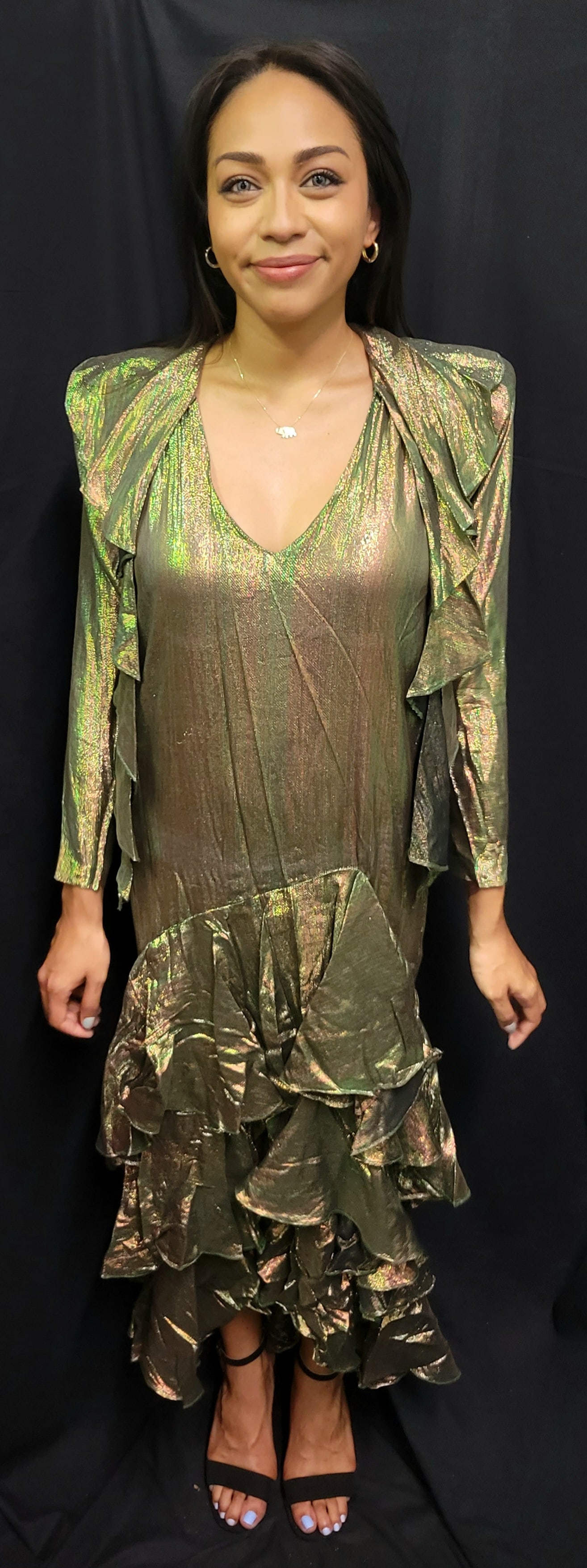 Irene Cara Estate OMO Norma Kamali Semi Sheer Iridescent Ruffle Dress COA: Irene Cara Estate OMO Norma Kamali semi sheer iridescent ruffle dress COA. OMO Norma Kamali tag, Shoulder pads, overlaying drapes, plunging neckline, 34in bust, 54in overall length, 47in under arms. S