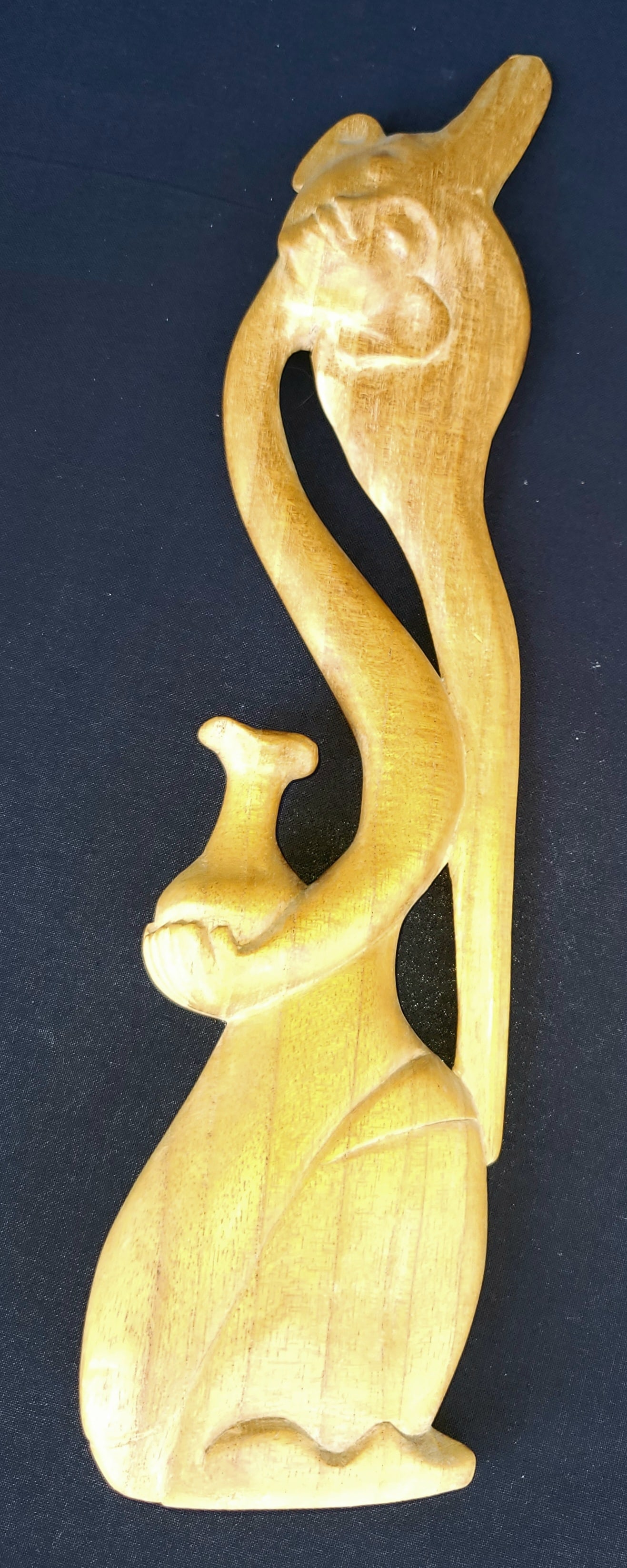 Irene Cara Estate FL Residence Sinuous Woman And Vase Carving COA: Irene Cara Estate FL Residence Sinuous Woman And Vase Carving COA. Figure 13.75in high, unsigned, vintage statue, sculpture perhaps Southeast Asia, Pacific Islands such as Thai or Indonesian. PROVENAN