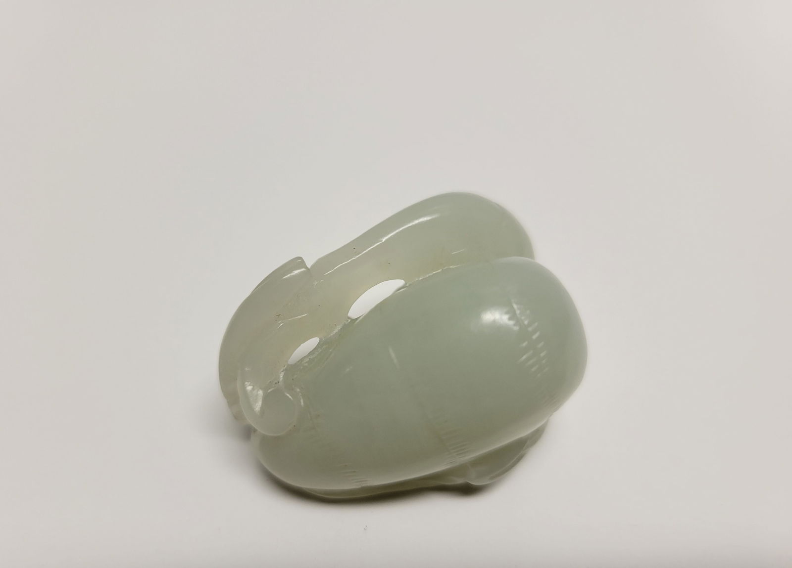 Klarich Collection Chinese Jade Gourd Carving Pale Celadon: Klarich Collection Chinese Jade Gourd Carving Pale Celadon. 1.5 x 1 x 1 inch.Provenance and Shipping: John and Brenda Klarich collected Chinese antiques for many decades principally in St. Louis and N