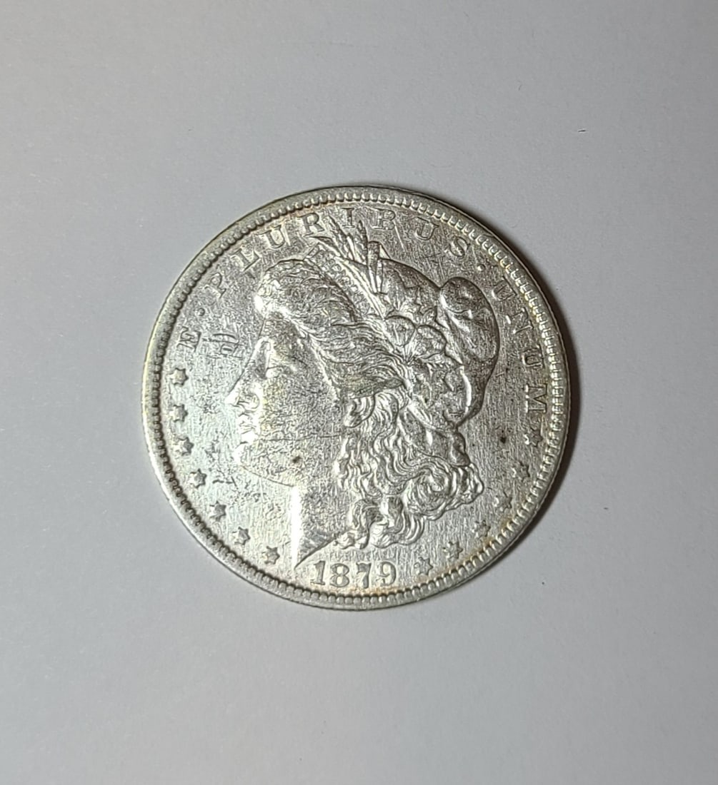 Silver Dollar 1879 Morgan: Silver Dollar 1879 Morgan. SHIPPING and PICKUP: We do not ship in house. All lots in this sale are referred to our preferred UPS Store whose information appears in the item invoice. They do not accept