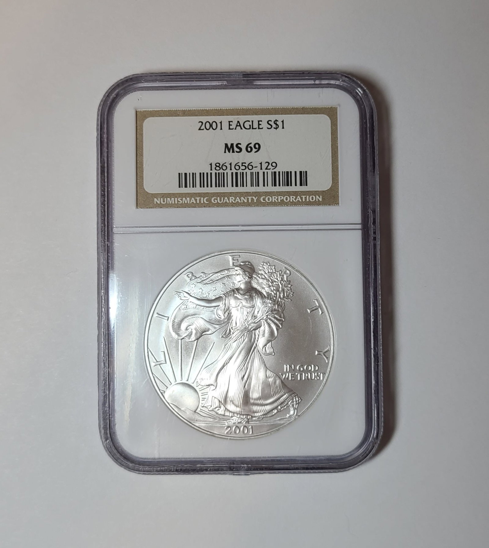 Silver Dollar 2001 Eagle: Silver Dollar 2001 Eagle. SHIPPING and PICKUP: We do not ship in house. All lots in this sale are referred to our preferred UPS Store whose information appears in the item invoice. They do not accept
