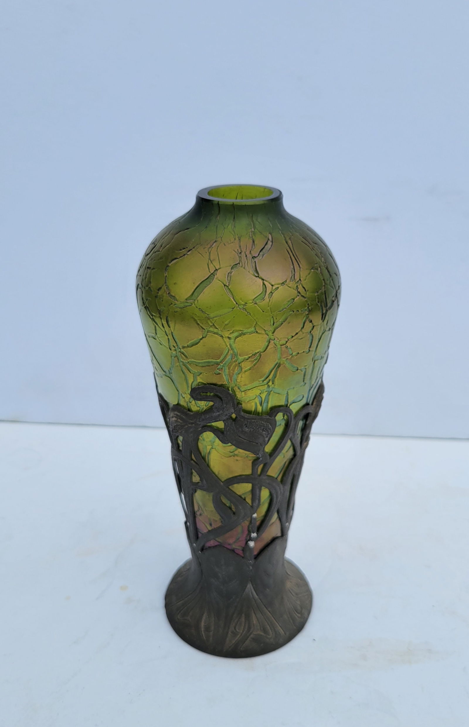 Loetz Type Antique Art Glass Metal Mounted Art Nouveau Iridescent Acid Etched Vase 8.75in Overall: Loetz Type Antique Art Glass Metal Mounted Art Nouveau Iridescent Acid Etched Vase 8.75in Overall. Unsigned, pewter zinn or spelter white metal clip on base, 8.75in overall in metal base x 3.5in at wi