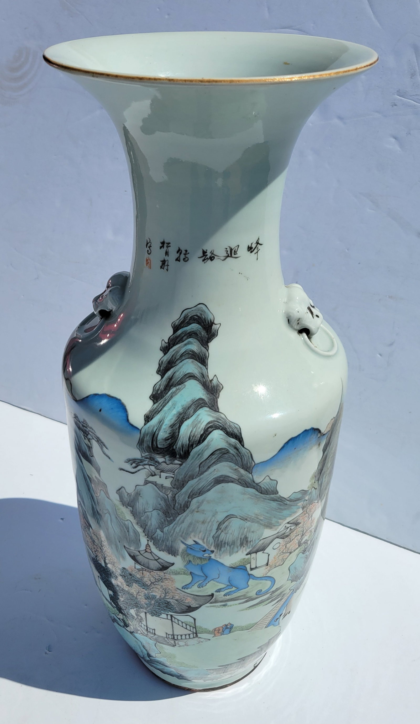 Large Antique Chinese Famille Rose Verte Qing Foo Handle Blue Lion Mountain Landscape Poetry Signed: Large Antique Chinese Famille Rose Verte Qing Foo Handle Blue Lion Mountain Landscape Poetry Signed Or Stamped On Sides 23in Porcelain. 23in high, 9in at widest point. RSI 5.24.21.Shipping: LiveAuctio