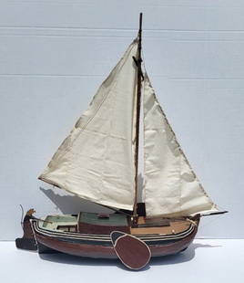 Large Antique Folk Art Pond Sailer 29.5in Long Sail Boat Nautical Marine Carved Painted Sailing Ship: Large Antique Folk Art Pond Sailer 29.5in Long Sail Boat Nautical Marine Carved Painted Sailing Ship Model. In old paint of undetermined age, 31in x 29.5in x 10in, working rudder with gilt eagle carvi