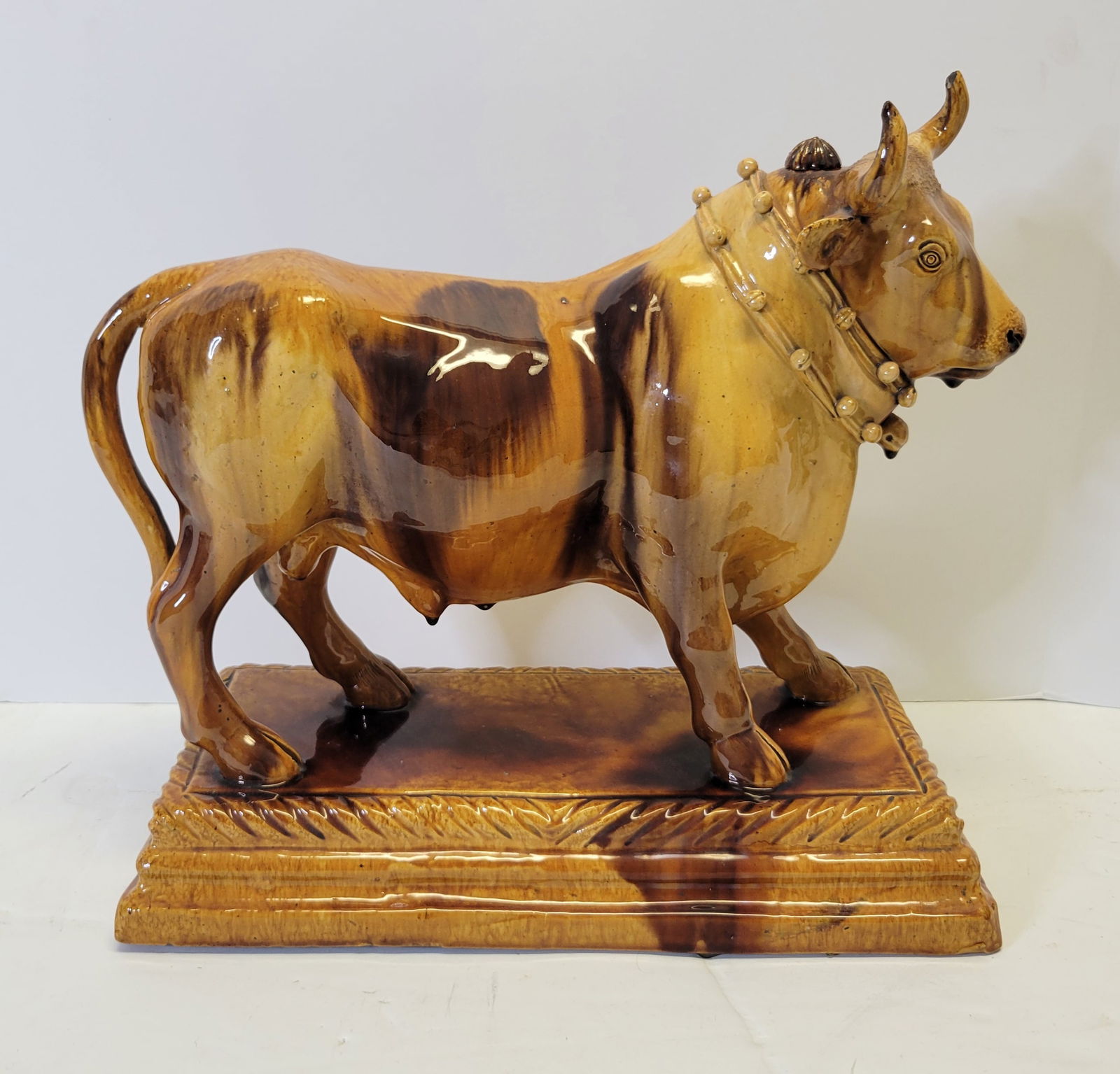 Large Old Pottery Bull Decanter Faience 15in Long Continental Wine Milk Ect: Large Old Pottery Bull Decanter Faience 15in Long Continental Wine Milk Ect. Has upper stopper and lower spout, see condition report including for note of horn tip losses.Provenance: Tampa Bay exclusi