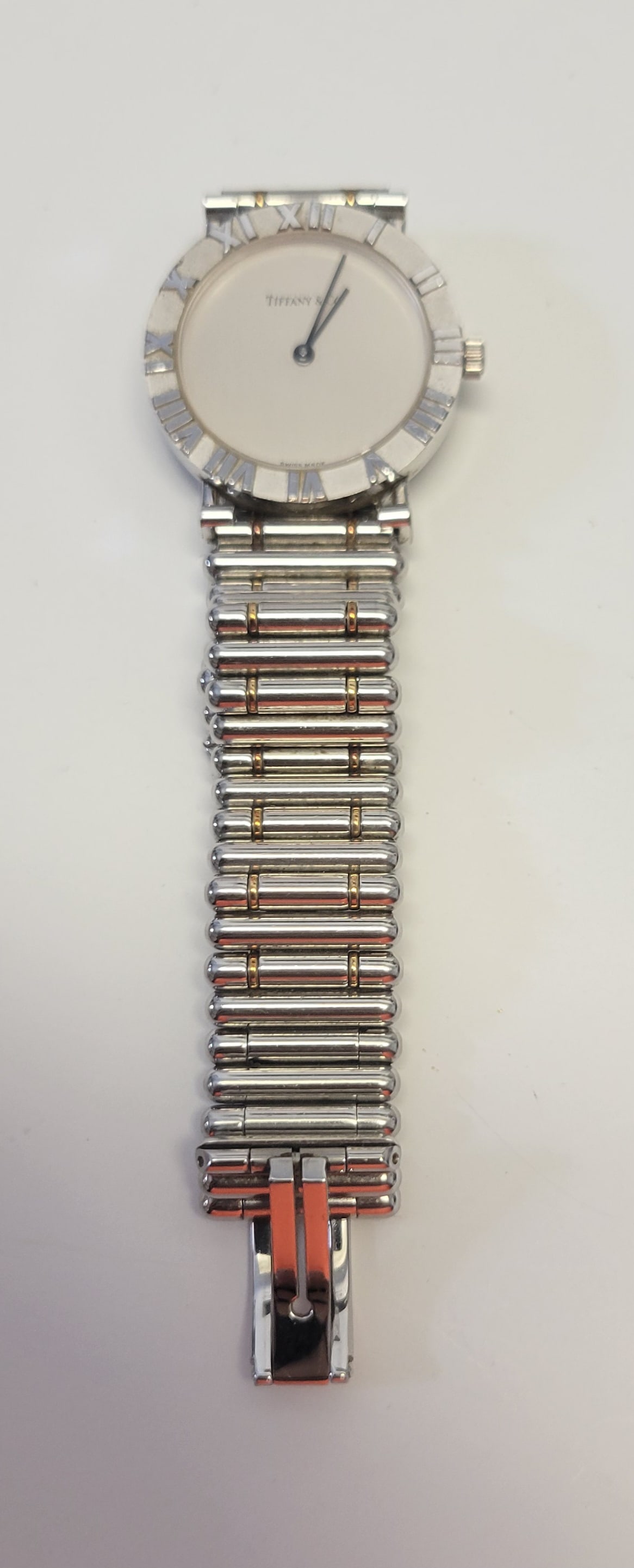 Tiffany Co Atlas Watch Sterling Silver Unisex With Breitling Bracelet: Tiffany Co Atlas Watch Sterling Silver Unisex With Breitling Bracelet. ETA quartz 256031 movement, sterling silver case, with Breitling bracelet, note thin gold spacers may be 18k gold but unverified.