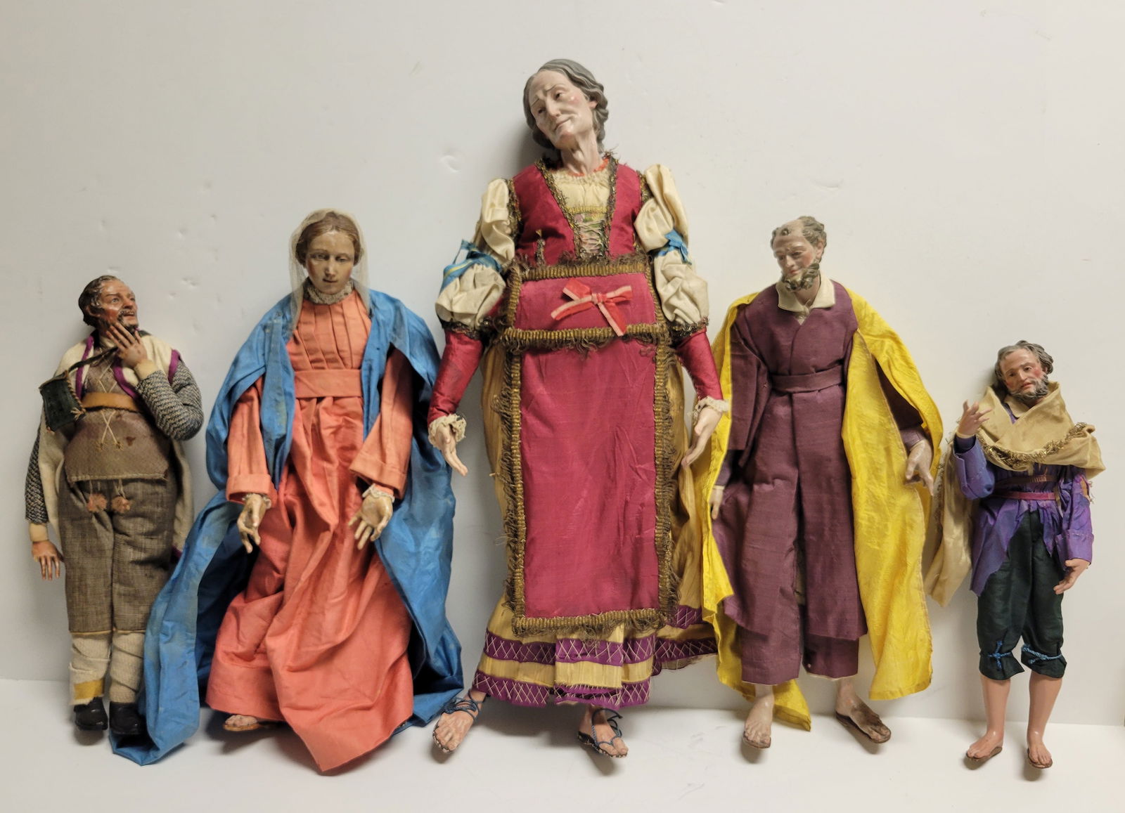 Group 5 Antique Polychrome Carved Wood Saint Or Worshipper Statues WWII Written Provenance 11.5 To: Group 5 Antique Polychrome Carved Wood Saint Or Worshipper Statues WWII Written Provenance 11.5 To 19.5 Inches, Note: According to the family, this figure group was discovered in Europe during World W