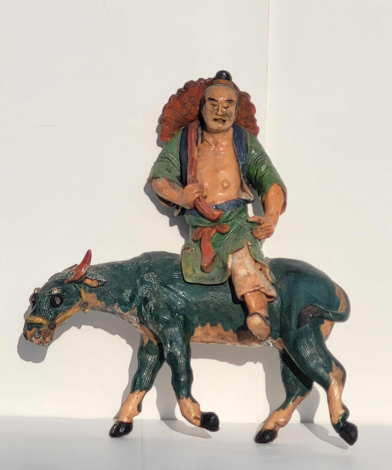 Circa Ming Dynasty Chinese Roof Tile Poly Chrome Terracotta Pottery Man On Ox Or Cow 12in High: Circa Ming Dynasty Chinese Roof Tile Poly Chrome Terracotta Pottery Man On Ox Or Cow 12in High. 12in x 10in x 3in. Note: we have offered a number of these over the years and they often feature a bit o