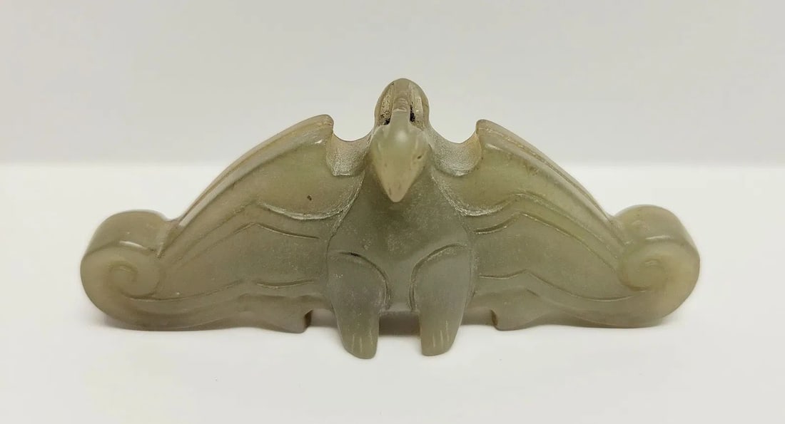 Klarich Collection Antique Chinese Jade Bat Color Variation Each Side Animal Carving: Klarich Collection Antique Chinese Jade Bat Color Variation Each Side Animal Carving. 1.5 x 3.5 0.75 inches. Note one side toward an olive green hue and the other toward a dark celadon hue. Family sta