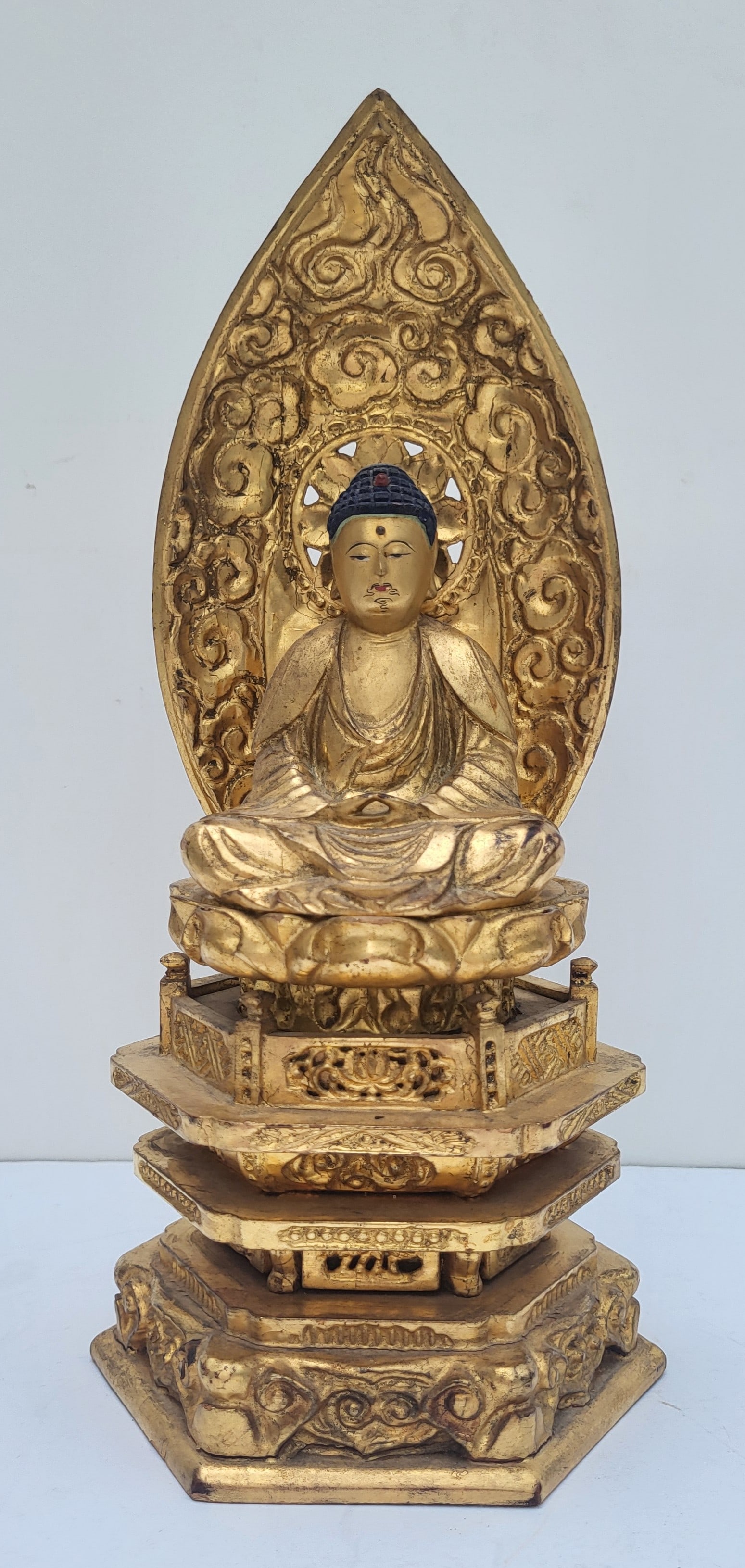 Tall Early Antique Japanese Carved Gilt Wood Shrine With Deity On Lotus 8.75 Inch Figure 15.5 Inch: Tall Early Antique Japanese Carved Gilt Wood Shrine With Deity On Lotus 8.75 Inch Figure 15.5 Inch Enclosure, item overall is 15.5 X 5.75 X 4.15 inches, shrine enclosure has a gilt interior and a blac