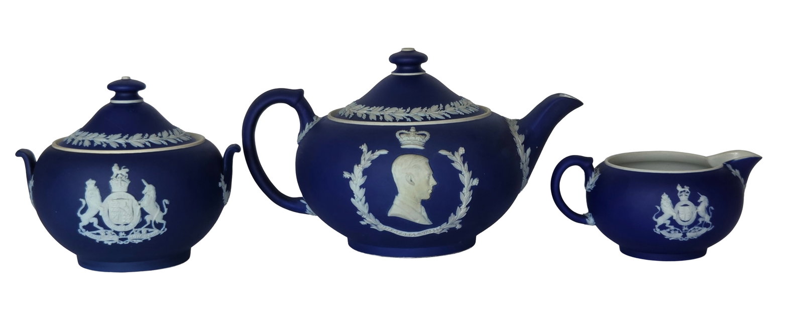 Wedgwood England Blue Jasperware Teapot Creamer Sugar Bowl Tea Service Set: Wedgwood England Blue Jasperware Teapot Creamer Sugar Bowl Tea Service Set. Teapot measures 8.75 inches handle to spout, 6 inch body diameter and 5.5 inches tall including lid. Creamer measures 5.25 i