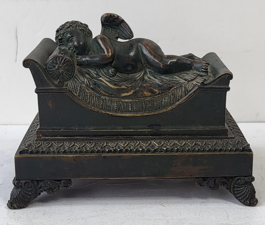 Nice Antique Bronze French Continental Footed Lidded Figural Sleeping Angel Cherub Inkwell 4 X 5.5 X: Nice Antique Bronze French Continental Footed Lidded Figural Sleeping Angel Cherub Inkwell 4 X 5.5 X 2.75 Inches. Provenance: Tampa Bay Florida estate of a family with ties to Central and or South Ame