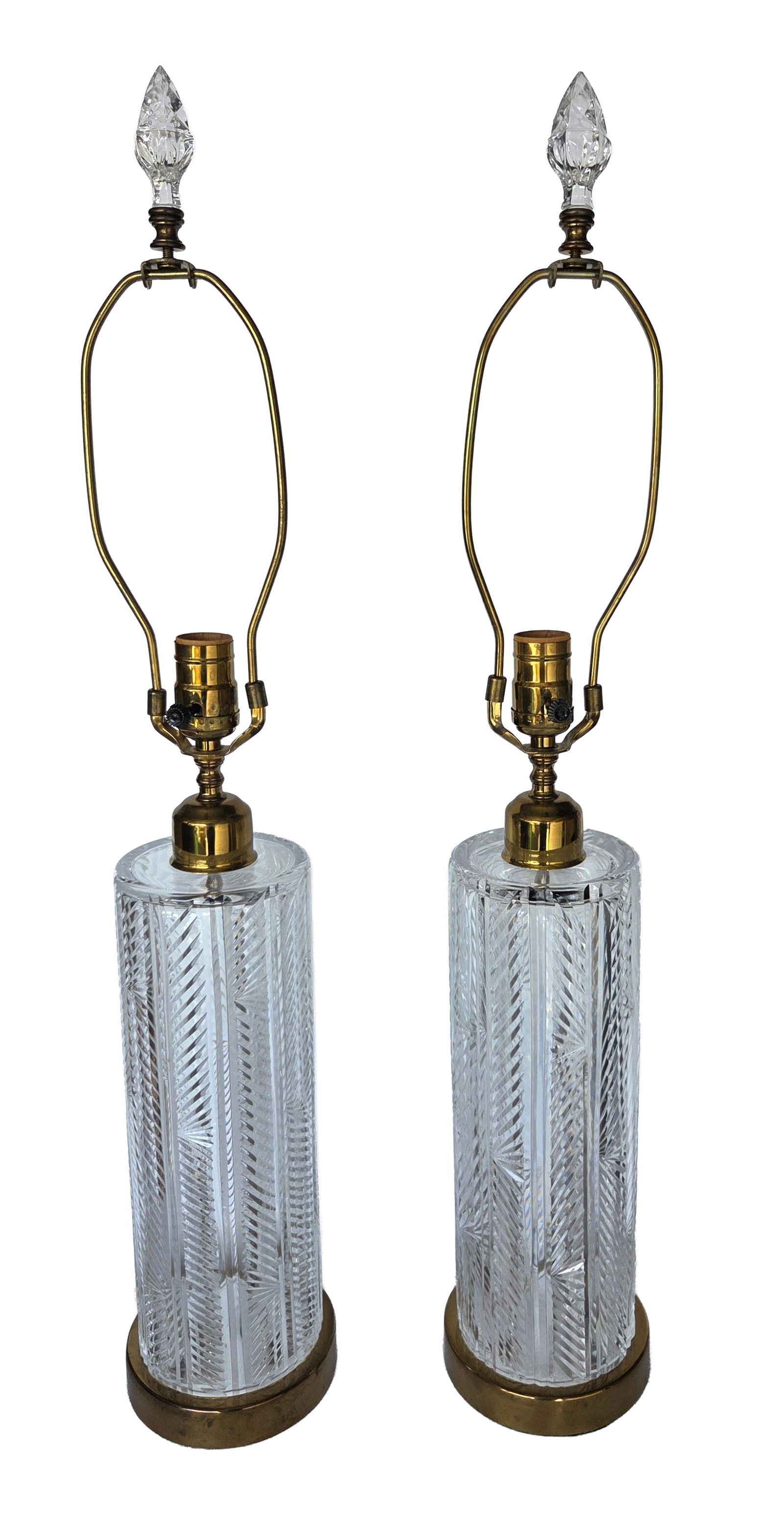 Pair Waterford Cut Crystal Glass Electric Lamps: Pair Waterford Cut Crystal Glass Electric Lamps. Each is signed. One has a Waterford label base underside. Finials are also crystal. No shades are included. 29.25 inches total height including finial,