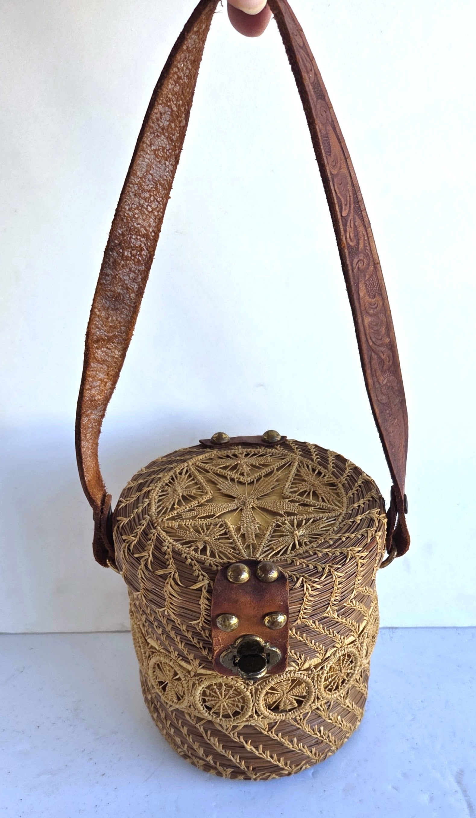 Vintage Woven Basket Tooled Leather Brass Mounted Fabric Lined Purse: Vintage Woven Basket Tooled Leather Brass Mounted Fabric Lined Purse. 5.25 inches tall, 5.5 inch diameter, 13 inch total hanging length with strap. Some of these baskets are Native American or African
