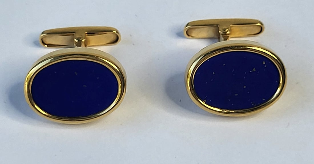 Attractive Pair Lapis Lazuli 18K Gold Oval Cufflinks 12.8 Tg 8.3Tdwt 0.75 X 0.55 Inch Tops: Attractive Pair Lapis Lazuli 18K Gold Oval Cufflinks 12.8 Tg 8.3Tdwt 0.75 X 0.55 Inch Tops, stamped 750 to indicate 18 karat gold, illegible adjacent maker or 18K stamp. There is a condition report el