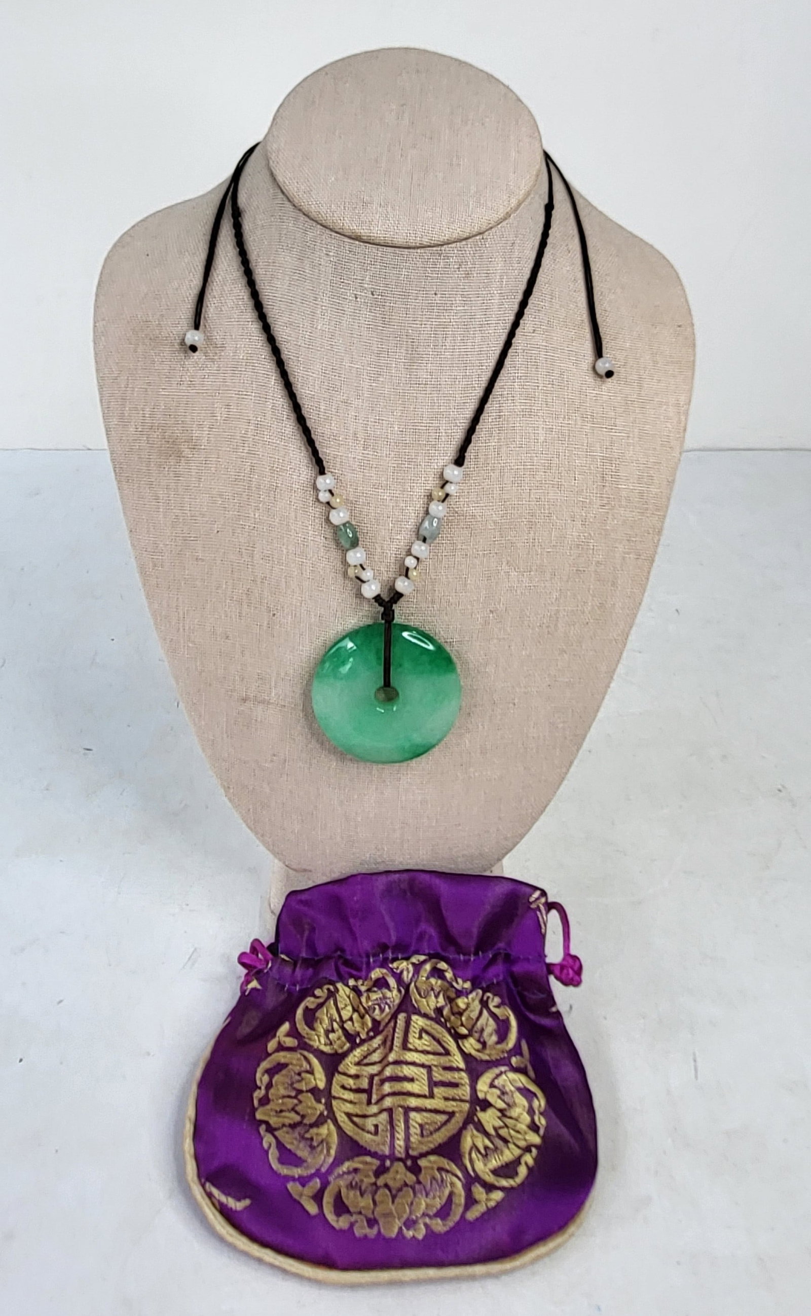 Carved Chinese Jade Subtle Moss In Snow Large Heavy Bi Disc With Beaded Cord Necklace 1.375 X 0.25: Carved Chinese Jade Subtle Moss In Snow Large Heavy Bi Disc With Beaded Cord Necklace 1.375 X 0.25 Inch Pendant Cord Tied At 16 Inches, accompanied by a silk purse. There is a condition report elsewhe