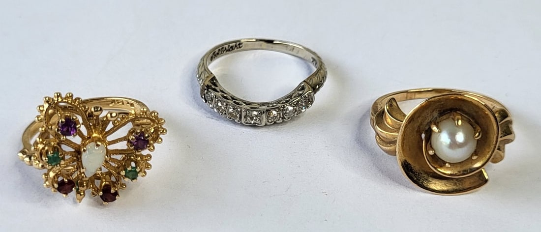 Lot 3 Marked 14K Rings Incl Pearl Opal And Diamond 6.8 Dwt: Lot 3 Marked 14K Rings Incl Pearl Opal And Diamond 6.8 Dwt, total objects weight 6.8dwt, all marked 14K, see condition report. Provenance: Property of a Florida Gulf Coast funeral industry professiona