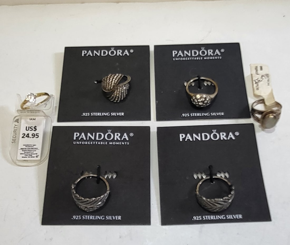 Lot 6 Pandora Sterling Silver Nordstrom Et Al Fashion Rings: Lot 6 Pandora Sterling Silver Nordstrom Et Al Fashion Rings. Various sizes, includes 4 carded Pandora rings all with price tags plus a tagged Nordstrom inlaid faceted stone or paste and a Thai zircon 