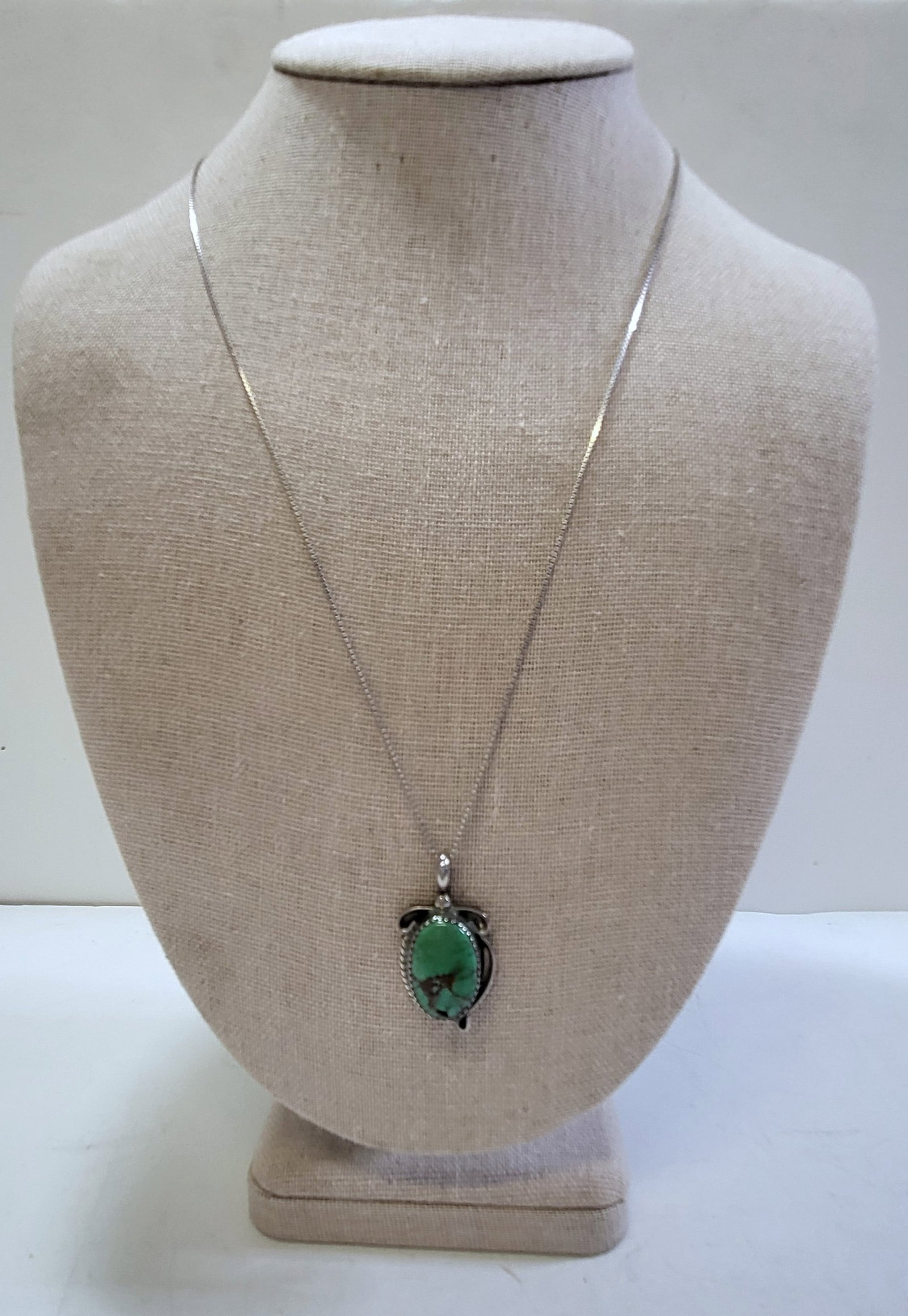Signed Native American Sterling Silver Turquoise Calvin Tom Navajo Pendant Necklace: Signed Native American Sterling Silver Turquoise Calvin Tom Navajo Pendant Necklace, the pendant stamped C T and Sterling on an Italian 925 sterling silver chain. Pendant 1 X 0.75 X 0.25 inches exclud