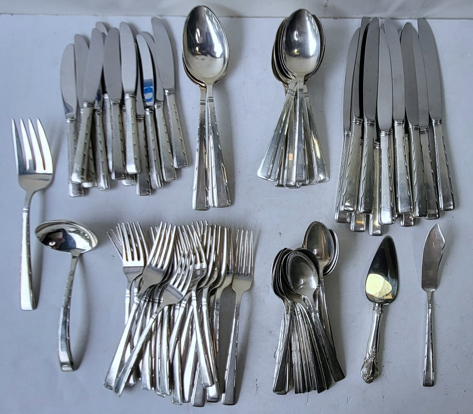 Set Sterling Silver Flatware 91 Pc Easterling Plus Addl Pie Server Net 90ozt: Set Sterling Silver Flatware 91 Pc Easterling Plus Addl Pie Server Net 90ozt. Four times 12pcs solid pieces plus two times 12pcs sterling handle stainless steel blade knives plus extra 12pcs solid pie