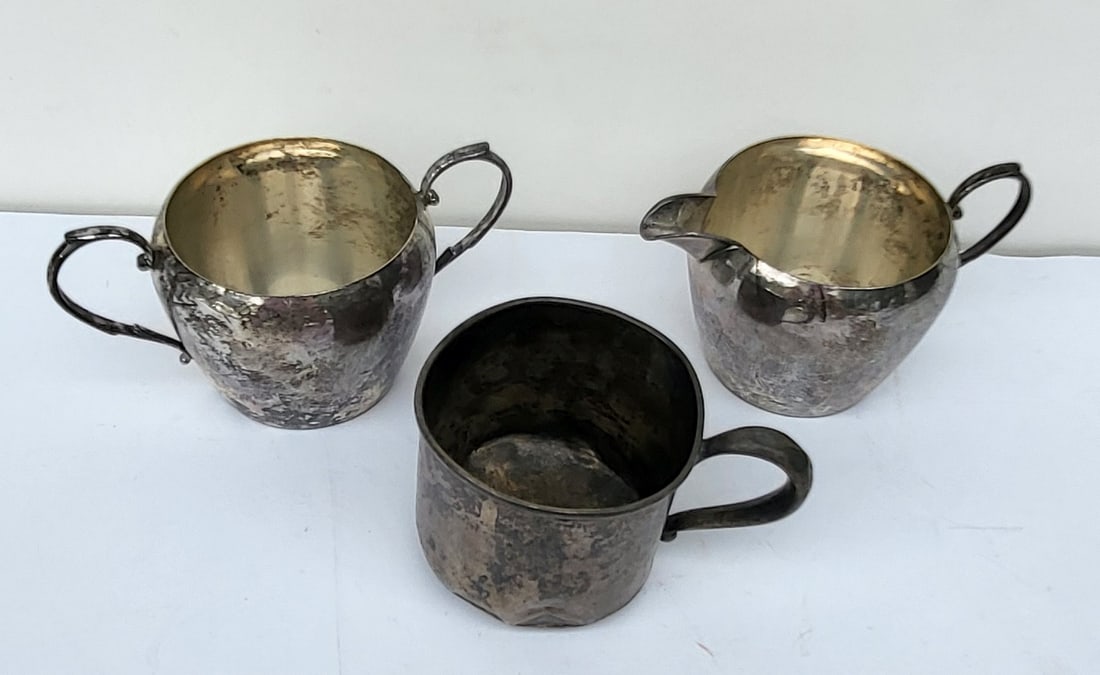 Sterling Silver Lot Art Deco Era Creamer Sugar Plus Antique Baby Mug: Sterling Silver Lot Art Deco Era Creamer Sugar Plus Antique Baby Mug 6ozt, each lip a bit over 2 inches high, the creamer and sugar stamped sterling underneath, the stamped sterling with Webster mark.