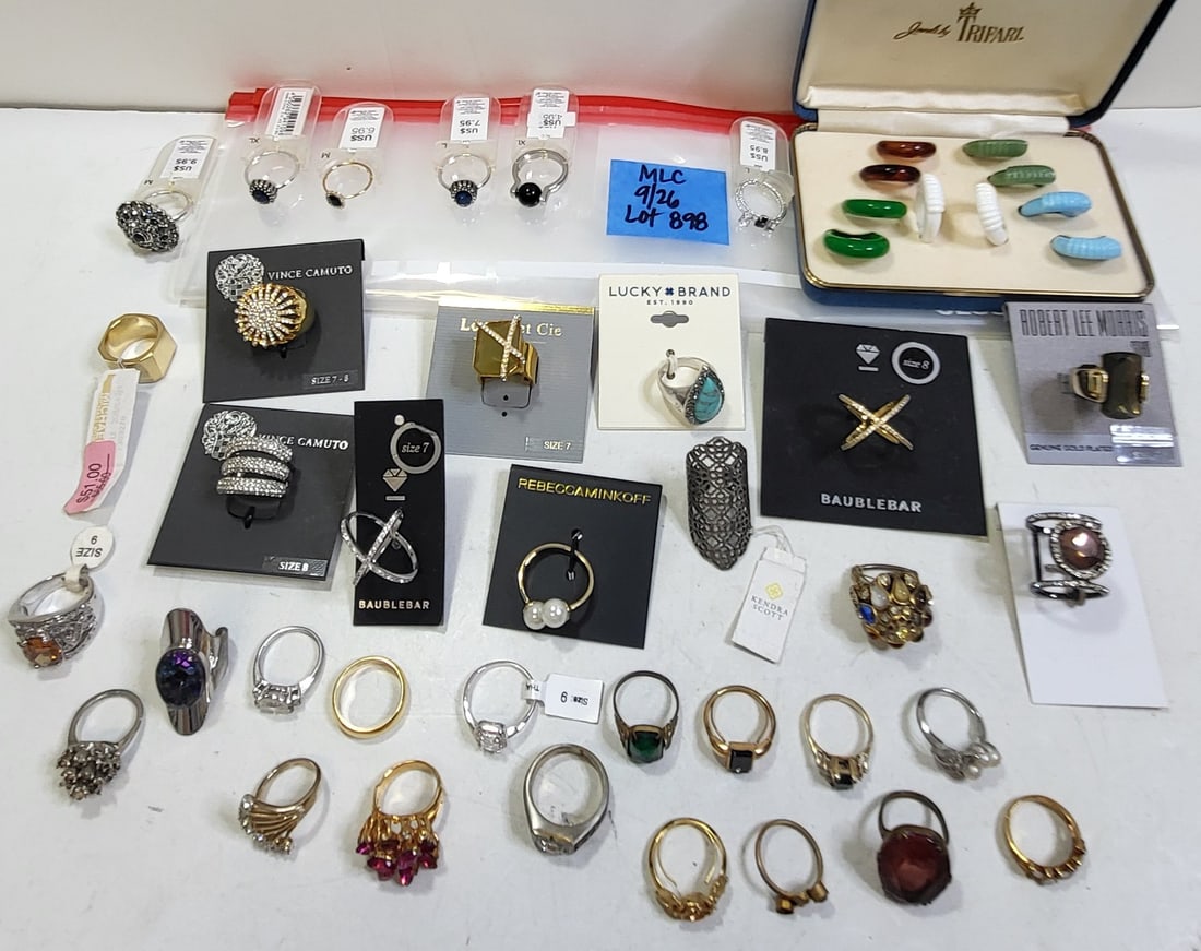Estate Costume Jewelry Lot Rings Incl 17 NWT Plus Boxed Trifari And 17 Additional One of An: Estate Costume Jewelry Lot Rings Incl 17 NWT Plus Boxed Trifari And 17 Additional One of An Incredible 150 Lots. Most of the costume jewelry descriptions in this collection are by photograph without s