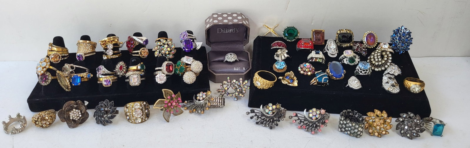 Estate Costume Jewelry 85 Rings Featuring Many Rhinestones And Gold Tone No Precious Metals One of: Estate Costume Jewelry 85 Rings Featuring Many Rhinestones And Gold Tone No Precious Metals One of An Incredible 150 Lots. Most of the costume jewelry descriptions in this collection are by photograph