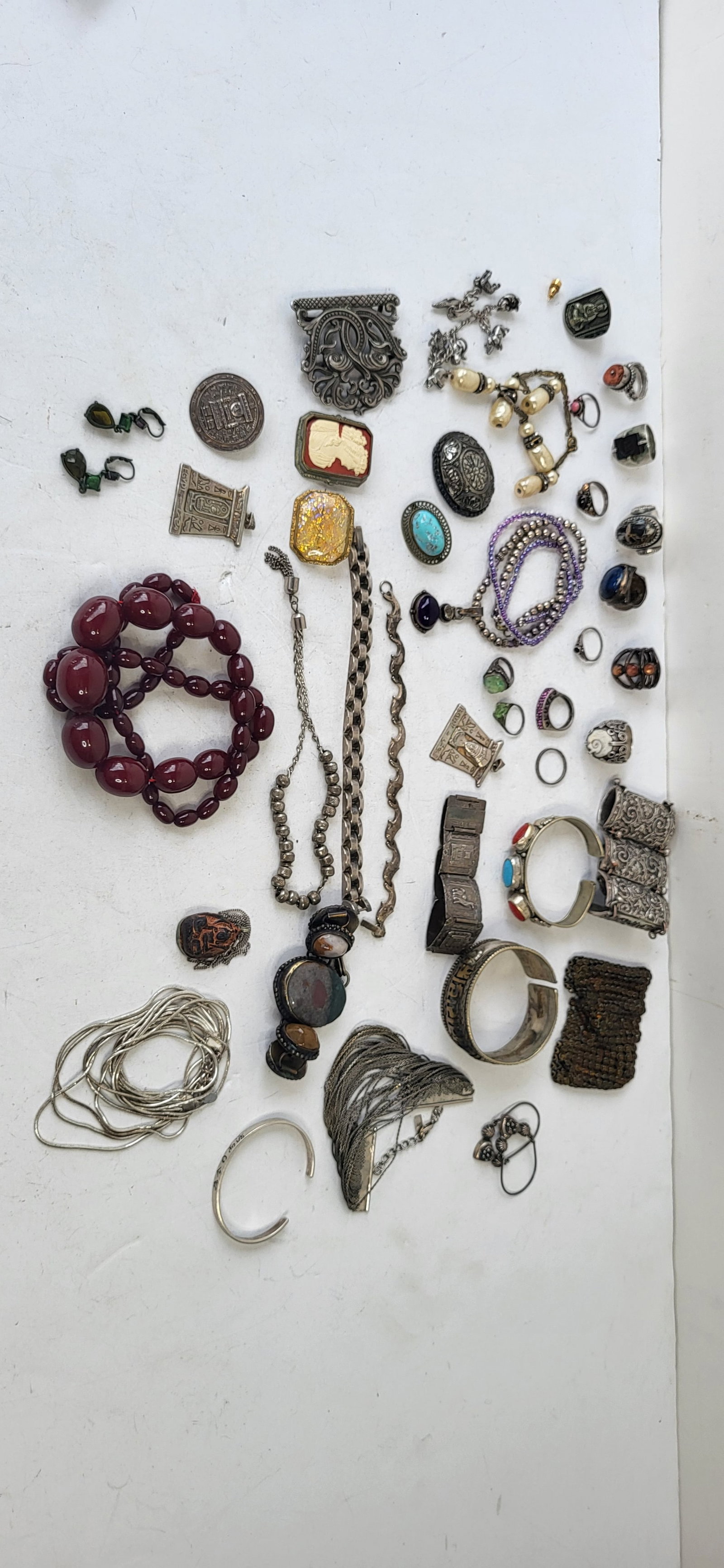 Estate Jewelry Box Contents Find 39 Pcs Sterling Lower Content Silver Silverplate Stones Beads Cameo: Estate Jewelry Box Contents Find 39 Pcs Sterling Lower Content Silver Silverplate Stones Beads Cameo Etc. Note the two multi strand silver metal items are magnetic and we then took 33 mostly metal mos