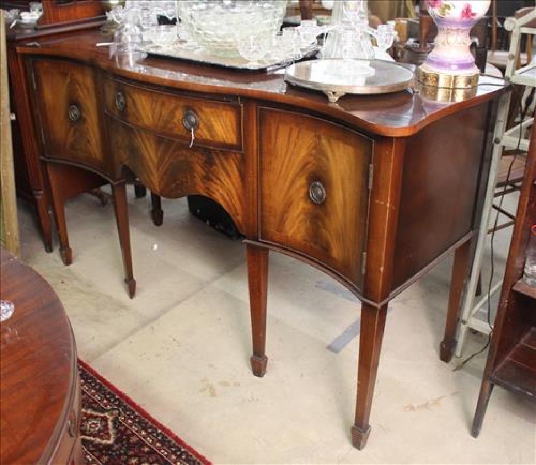 Mahogany Duncan Phyfe sideboard: Mahogany Duncan Phyfe sideboard with flame mahogany doors, 35 in. T, 60 in. W, 22 in. D.