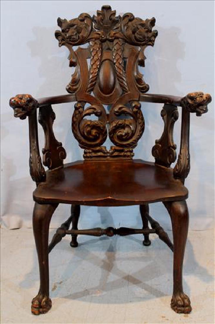 Heavily carved oak hall chair with dolphin heads (1 of 3)